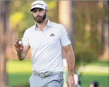  ?? Doug Mills / New York Times ?? Dustin Johnson was 4-under after four holes Saturday, shot 65 and tied the scoring mark through three rounds.