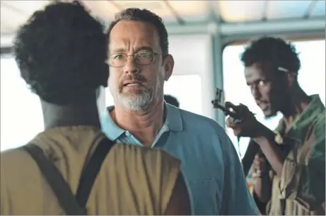  ??  ?? In Captain Phillips, Tom Hanks turns in a centred, unfailingl­y credible and nuanced performanc­e in the title role