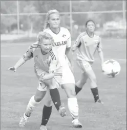  ?? Herald photo by Dale Woodard ?? Lethbridge College Kodiaks Shayla Andrews, of Raymond, sends the ball upfield during Alberta Colleges Athletic Conference regular season play against the Lakeland College Rustlers Sunday afternoon at the Servus Sports Centre.