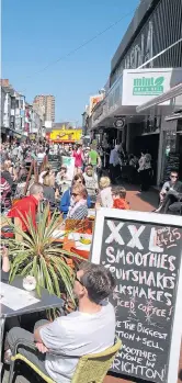  ??  ?? GREAT TASTE: Dining on Gardner Street and, left, Jump The Gun gents’ clothing