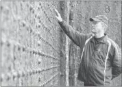  ??  ?? Bob Ballard explores the massive Thompson Dry Dock in Belfast, which was built especially for the Titanic and its sister ships.