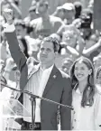  ?? AP PHOTO/ARIANA CUBILLOS ?? Venezuela’s self-proclaimed interim president Juan Guaido, accompanie­d by his wife Fabiana Rosales, attends a demonstrat­ion against the government of President Nicolas Maduro, in Caracas, Venezuela on Tuesday.