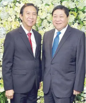  ??  ?? 8990 Holdings Inc. chairman Mariano Martinez and president and CEO Willie J. Uy.