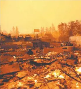  ?? JOSH EDELSON / AFP ?? As chamas deixaram um rastro de destruição em Sacramento