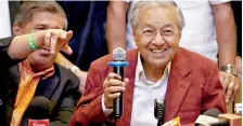  ??  ?? Mahathir Mohamad, former Malaysian prime minister and opposition candidate for Pakatan Harapan (Alliance of Hope) attends a news conference after general election, in Petaling Jaya, Malaysia on Thursday. Reuters