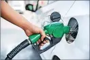  ?? ?? AT THE PUMP: Petrol prices rising