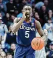  ?? Jeff Dean/Associated Press ?? UConn’s Hassan Diarra shouts to his teammates during a December game against Xavier.