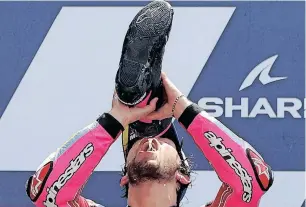  ?? | Reuters ?? ENEA Bastianini celebrates on the podium after winning the French MotoGP.