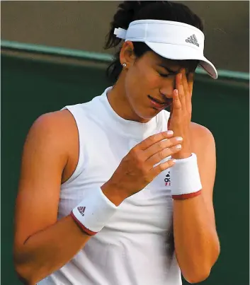  ?? PHOTO AFP ?? La défaite a été dure à avaler pour Garbine Muguruza, qui s’était coiffée des grands honneurs à Wimbledon l’an dernier.