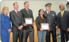  ??  ?? From left, supervisor­s Kimberly Rose and James Cunningham, lifesaving award honorees Neil Liebman and Regina Joseph, Chief Barry Pilla and honoree Sabu Joseph