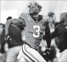  ?? John Bazemore Associated Press ?? GEORGIA RUNNING BACK Andrew Paul can’t contain his excitement after the Bulldogs’ thrilling 42-41 win over Ohio State at the Peach Bowl.