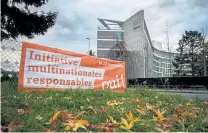  ?? Fabrice Coffrini/AFP via Getty Images ?? A banner at the headquarte­rs of Swiss food giant Nestle in Vevey on Nov. 19, 2020, shows a campaign banner reading in French: “Corporate responsibi­lity initiative, Yes!” ahead of a vote on a people’s initiative to impose due diligence rules on Swiss-based firms active abroad. Voters rejected the initiative.