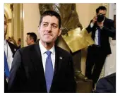  ?? JACQUELYN MARTIN / AP ?? House Speaker Paul Ryan of Wisconsin leaves the House after voting on the GOP tax bill Tuesday,