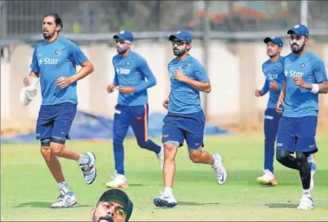  ??  ?? Ishant Sharma (left) is under pressure to retain his place in the side following a lacklustre performanc­e in Pune. Jayant Yadav could also be dropped for the Bengaluru Test that starts on Saturday.