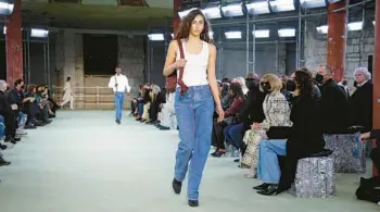  ?? VALERIO MEZZANOTTI/THE NEW YORK TIMES ?? A model walks for Bottega Veneta on Feb. 26 at the fall 2022 show in Milan.