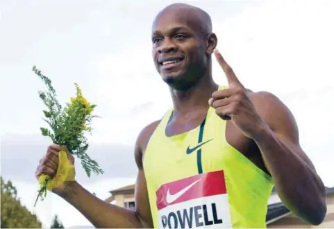  ??  ?? ITALY: In this Sept.7, 2014 file photo, Asafa Powell celebrates after winning the men’s 100 meters competitio­n at the IAAF Grand Prix in Rieti.—AP