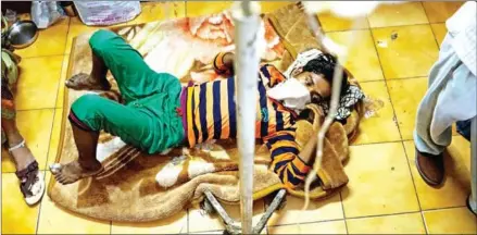  ?? CHANDAN KHANNA/AFP ?? An Indian patient suffering from breathing problems is treated at the Murari Lal Chest Hospital in Kanpur on June 1.