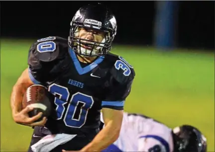  ?? MARK C PSORAS — THE REPORTER ?? North Penn’s Justin Ostopowicz (30) cuts past Central Bucks South defenders for a big gain during first-half action of their contest at North Penn High School on Oct. 2. North Penn visits Pennsbury tonight with both teams 4-0 in the Suburban One League...