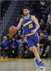  ?? JEFF CHIU — THE ASSOCIATED PRESS ?? Warriors guard Ty Jerome plays against the Sacramento Kings at Chase Center in San Francisco on Monday.