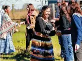  ?? ?? Tribal member Lucille Contreras, CEO of the Texas Tribal Buffalo Project, welcomes guests to a ceremony to mark the return of the buffalo.