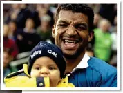  ?? ?? CHIP OFF THE OLD BLOCK: Emile Ntamack with baby Romain, who has grown into a hero for France (left)