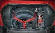  ??  ?? Anticipati­ng the needs of drag racers, Dodge SRT’s Demon team designed a trunk organizer designed with specific niches to keep front wheels, floor jack and other items secure.