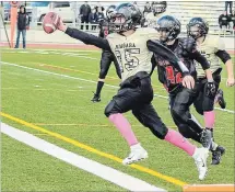  ?? JEN STEWART SPECIAL TO THE ST. CATHARINES STANDARD ?? Niagara's Jackson Stewart (15) crosses the goal line in Ontario Football League quarter-final action in Brantford.