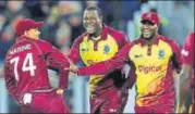  ?? REUTERS ?? Windies captain Carlos Brathwaite (centre) said players were concerned about injuries on the wet outfield.