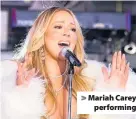  ??  ?? Mariah Carey performing