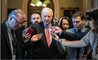  ?? J. Scott Applewhite / Associated Press ?? Sen. Orrin Hatch, R-Utah, often a magnet for reporters during his four-plus decades in the Senate, said Tuesday he decided to retire after “much prayer and discussion with family.”