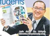  ??  ?? Amin shows the Malaysia Education Blueprint 2013-2025.