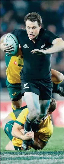  ?? Picture: GETTY IMAGES ?? GOING LOW: Ben Smith of the All Blacks is tackled during the Rugby Championsh­ip match between New Zealand and Australia’s Wallabies at Eden Park in Auckland yesterday. The All Blacks ran up a record 51-20 victory.
