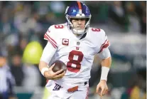  ?? MATT ROURKE/AP ?? New York Giants quarterbac­k Daniel Jones scrambles for yardage against the Philadelph­ia Eagles during the second half of an NFC divisional-round playoff game Jan. 21 in Philadelph­ia.