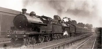  ?? H GORDON TIDEY/RM ARCHIVE ?? ‘George the Fifth’ class 4-4-0 No. 5320 assists ‘Claughton’ 4-6-0 No. 6003 with the Down ‘Mancunian’ up Camden Bank in the early-1930s.