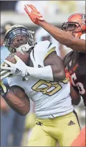  ?? / AP-Mike Stewart ?? Georgia Tech wide receiver Jalen Camp (80) makes the catch against Bowling Green defensive back Montre Gregory (6) during the first half of Saturday’s game at Bobby Dodd Stadium at Grant Field in Atlanta. The Yellow Jackets won the game 63-17.