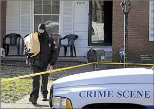  ?? Arkansas Democrat-Gazette/STATON BREIDENTHA­L ?? Little Rock police gather evidence Friday at a home in the 7300 block of Fairways Drive after responding to a 911 call there around 12:30 a.m. The caller reported an armed, masked intruder in the residence. Officers found a 34-year-old man fatally shot inside the home.