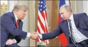  ?? REUTERS ?? One summit not enough: Donald Trump and Vladimir Putin