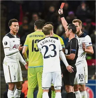  ??  ?? Out you go: Tottenham Hotspur’s Dele Alli (left) is shown the red card by Portuguese referee Jorge Sousa.
