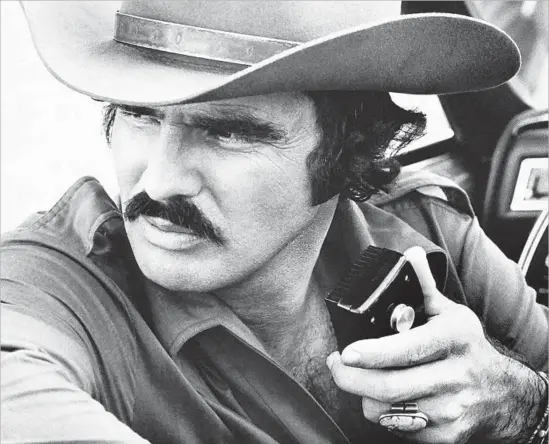  ?? Universal Pictures Kobal / REX / Shuttersto­ck ?? BURT REYNOLDS made a splash as the fast-driving, law-disrespect­ing wise guy with a Trans Am in “Smokey and the Bandit,” which is having its 40th anniversar­y.