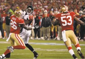  ?? Beck Diefenbach / For The Chronicle 2013 ?? Niners linebacker NaVorro Bowman snags a gamesealin­g intercepti­on in the fourth quarter of the Candlestic­k Park finale, a 3424 win, on Dec. 23, 2013.