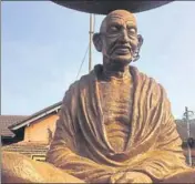  ?? HT PHOTO ?? In Thaliparam­bha in north Kerala’s Kannur, vandals damaged the spectacles and a garland on a Mahatma Gandhi statue.