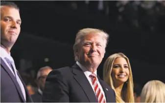  ?? Jessica Griffin / Philadelph­ia Inquirer 2016 ?? President Trump, with son Donald Trump Jr. and daughter Ivanka Trump at the GOP convention last year, has engaged a number of industry insiders to help roll back regulation­s.