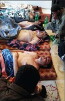  ?? ALAA ALYOUSEF — THE ASSOCIATED PRESS ?? Victims of the suspected chemical weapons attack lie on the ground, in Khan Sheikhoun Tuesdsay in the northern province of Idlib, Syria. The death toll from a suspected chemical attack on a northern Syrian town rose to 72 on Wednesday as activists and...