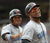  ?? ANDY CLAYTON-KING — THE ASSOCIATED PRESS ?? Edwin Encarnacio­n, right, is congratula­ted by Jose Ramirez after a two-run home run in the fourth inning.
