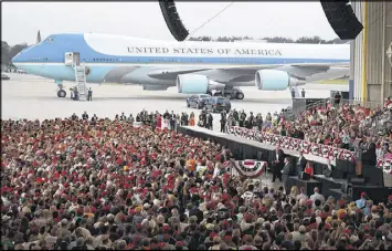  ?? JOE RAEDLE / GETTY IMAGES ?? “I want to be among my friends and among the people,” President Donald Trump told a cheering crowd at an airport hangar in Florida on Saturday.