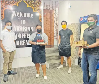  ?? Picture: ABISHEK CHAND ?? Staff members of Arabian Coffee Break and Car Wash.