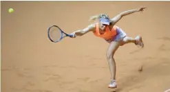  ?? Prix.—AFP ?? STUTTGART: Russia’s Maria Sharapova fails to return the ball to France’s Kristina Mladenovic during their semi-final tennis match at the WTA Porsche Tennis Grand