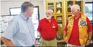  ?? Westside Eagle Observer/SUSAN HOLLAND ?? Jay Oliphant (left) talks with Gravette Lions Club president Jeff Davis and club secretary Al Blair after being inducted as a new member Tuesday, Sept. 20, at the Billy V. Hall Senior Activity Center.