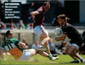  ??  ?? GATHERING: Westmeath keeper Darren Quinn in action against Offaly