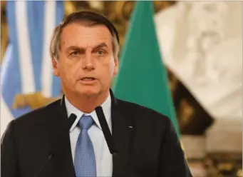  ?? Foto: Natacha Pisarenko/AP ?? Brasiliens praesident, Jair Bolsonaro, har svaere forhold at arbejde under. Med 30 partier i underhuset og 21 i Senatet er det mere end svaert at få besluttet noget som helst.